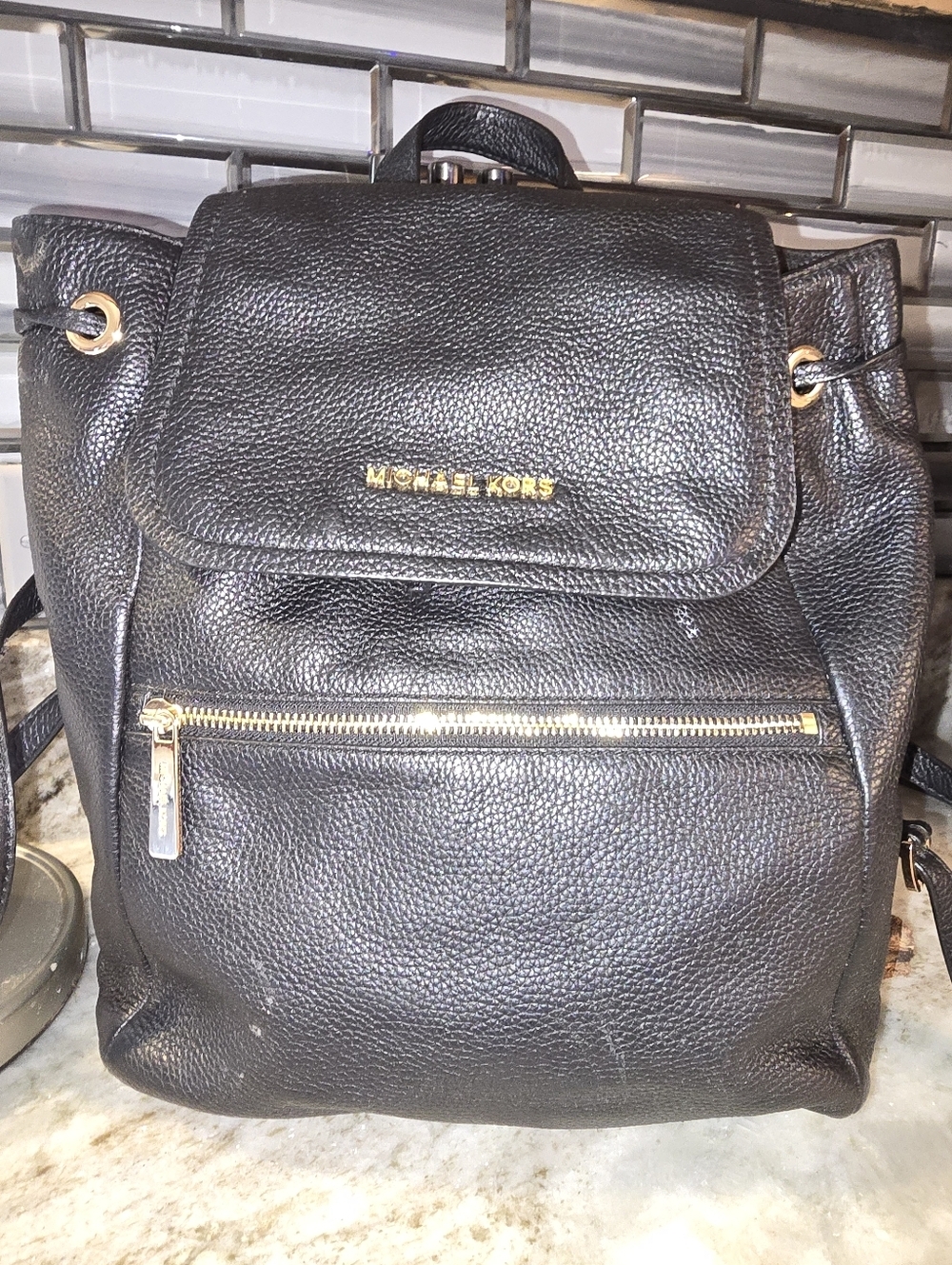 Michael Kors Black Pebbled Leather Flap Backpack with Gold Hardware